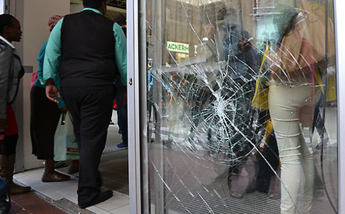 FILE: Damage to an Adderley Street shop front after protesters demonstrated in in the Cape Town CBD on 30 October 2013. Picture: Aletta Gardner/EWN