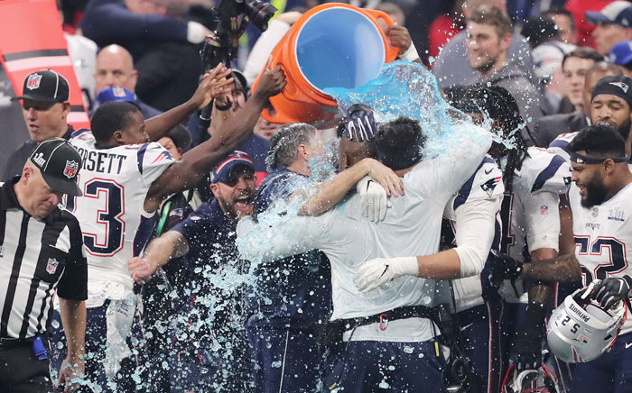 New England Patriots players give head coach Bill Belichick a Gatorade shower after winning the Super Bowl LIII at Mercedes-Benz Stadium on 3 February 2019 in Atlanta, Georgia. Picture: AFP