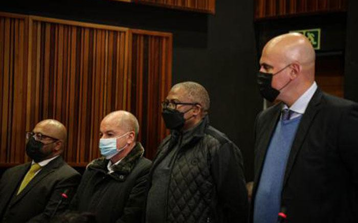 Former Transnet Group CEO, Siyabonga Gama (centre), and his co-accused appear in the Palm Ridge Magistrates Court on 27 May 2022 following their arrest on the same day. Picture: Xanderleigh Dookey Makhaza/Eyewitness News