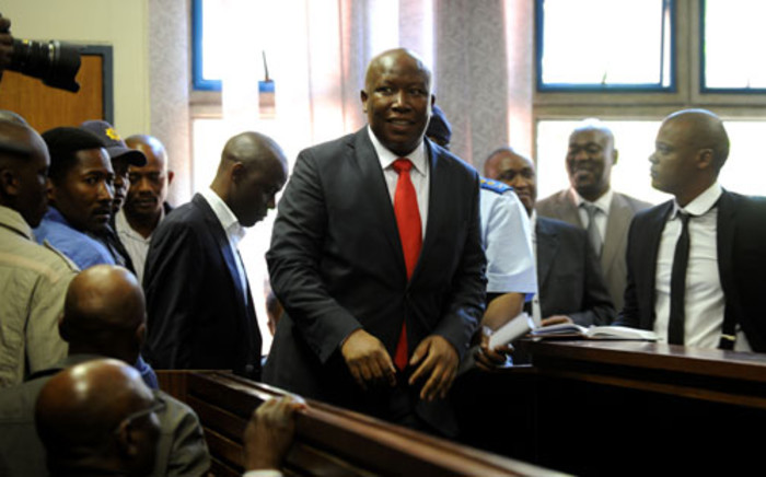 Expelled ANC Youth League president Julius Malema appears in the Polokwane Regional Court in Limpopo on Wednesday, 26 September 2012. Malema is accused of money-laundering. He handed himself over to the Polokwane police on Wednesday morning before his court appearance. Picture: Werner Beukes/SAPA