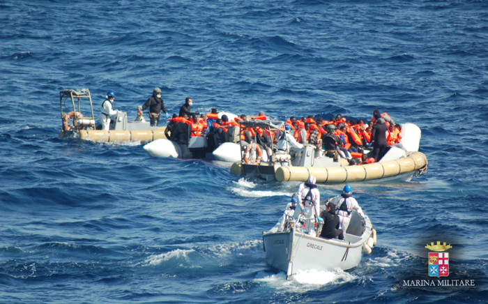 This handout picture released by the Italian Navy shows a rescue operation of migrants and refugees at sea, off the coast of Sicily, on 16 March 2016. Picture: Marina Militare/AFP.