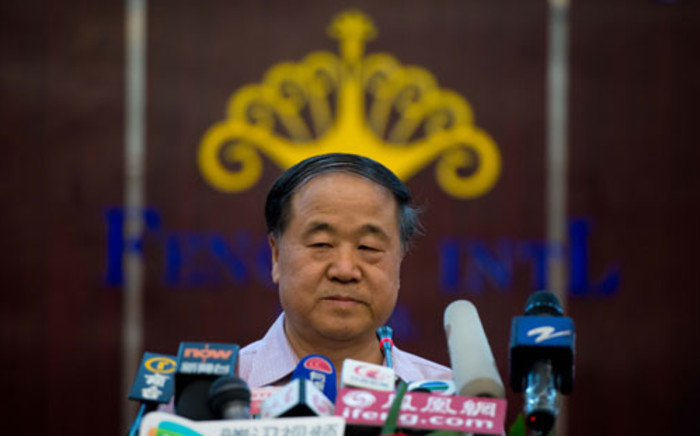 Chinese author Mo Yan attends a press conference at a hotel in Gaomi, in eastern China's Shandong province on October 12, 2012. Chinese author Mo Yan, some of whose works have cast an unflattering eye on official policy, said after winning the literature Nobel that it was a writer's duty to spotlight political and social issues. Picture: AFP.