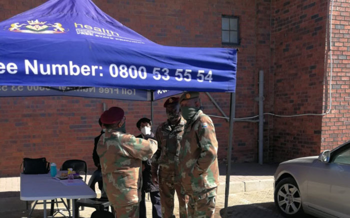 FILE: SA Military Health Service members help screen residents for COVID-19. Picture: @SANDFCorpEvents/Twitter