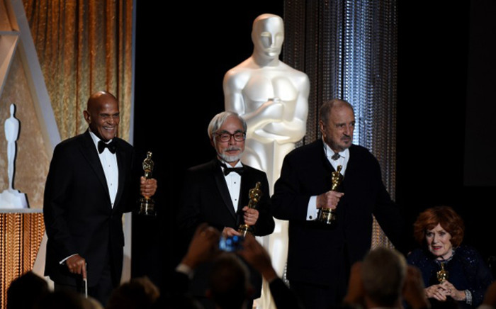 (L-R) Harry Belafonte, Hayao Miyazaki, Jean-Claude Carrière and actress Maureen O’Hara pose with their Honorary Awards. Picture: AFP