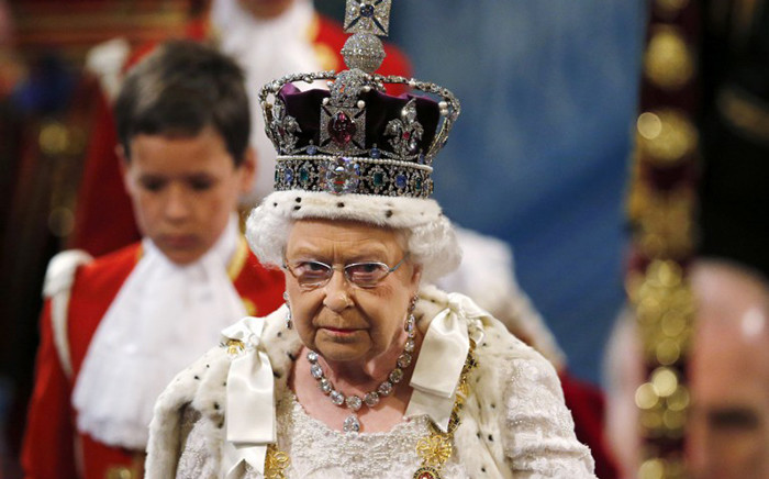 Britain’s Queen Elizabeth II, wearing the Imperial State Crown, proceeds through the Royal Gallery during the State Opening of Parliament at the Palace of Westminster in central London on 27 May, 2015. Picture: AFP.