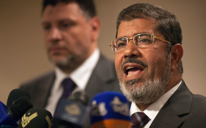 Muslim Brotherhood Egyptian presidential candidate Mohammed Morsi gives a press conference in Cairo on May 26, 2012. Picture: AFP
