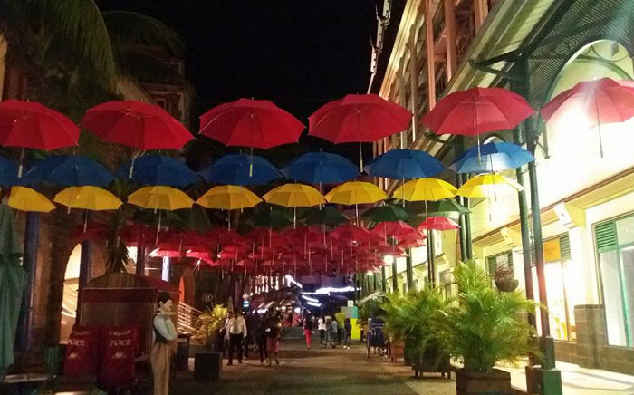 Umbrellas with the Mauritian flag colours at the Port Louis Waterfront in Mauritius. Picture: Refilwe Pitjeng/EWN.