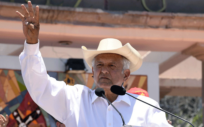 Mexican presidential candidate Andres Manuel Lopez Obrador waves to his supporters during a campaign rally in Zitacuaro, Michoacan state, Mexico, on 28 May 2018. Picture: AFP