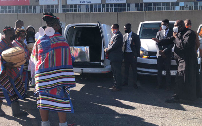 A traditional ceremony takes place following the arrival of Kgothatso Mdunana's remains at the OR Tambo International Airport on 7 June 2021. Picture: Mia Lindeque/Eyewitness News
