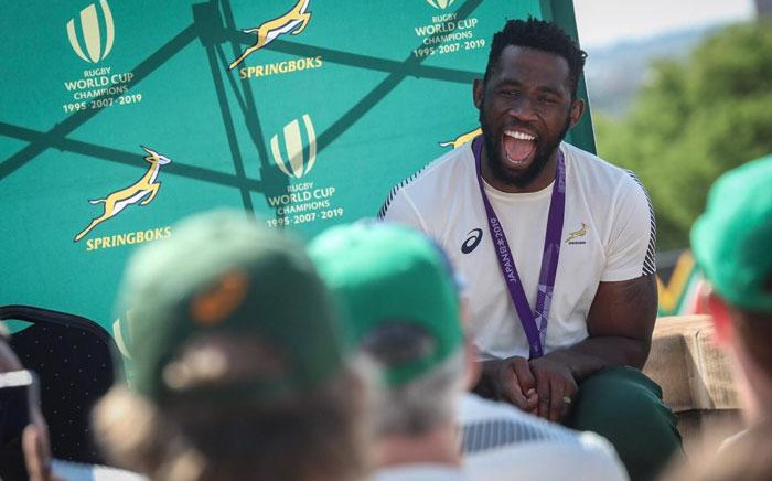 Springbok captain Siya Kolisi shares a laugh with supporters at the Union Buildings in Pretoria on 7 November 2019. Picture: Abigail Javier/EWN
