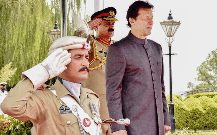 FILE: New Pakistani Prime Minister Imran Khan inspects a guard of honour on his arrival in the Prime Minister House during a ceremony in Islamabad. Khan was sworn in at a ceremony in Islamabad on 18 August. Picture: AFP