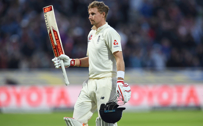 England's captain Joe Root walks back to the pavilion after losing his wicket for 136 during play on the first day of the first Test cricket match between England and the West Indies at Edgbaston in Birmingham, central England on 17 August 2017. Picture: AFP.