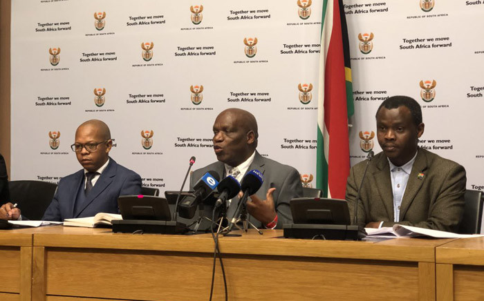 Agriculture Minister Senzeni Zokwana (centre) addressing the media in Cape Town on 2 August. Picture: @SAgovnews/Twitter