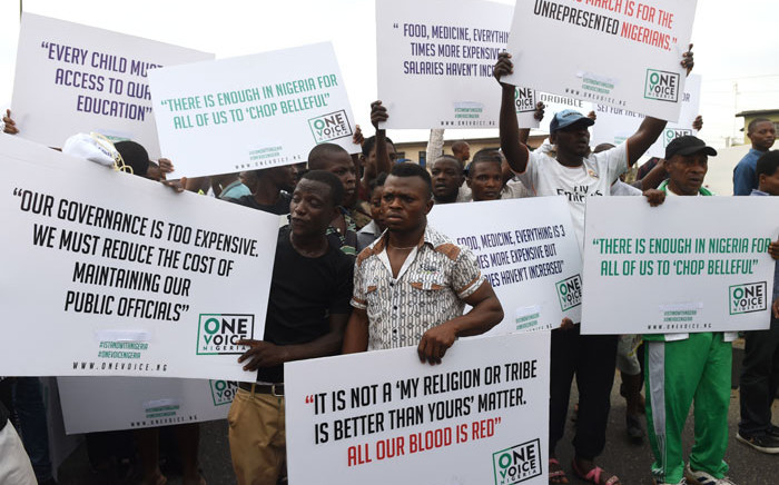 Protesters hold placards during an anti-government demonstration in Lagos, Nigeria on February 6, 2017. Picture: AFP