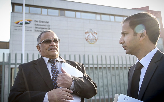 General Arno Lamoer (left) arrives for his trial for fraud and corruption at Goodwood Magistrates Court on 12 June 2015. Picture: Thomas Holder/EWN.
