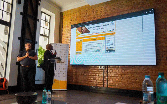 Sassa Western Cape acting regional manager Abraham Mahlangu demonstrates how the process of booking a disability grant medical assessment online goes. Picture: @OfficialSASSA/Twitter.