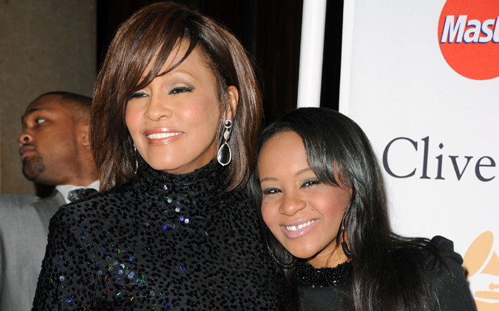 FILE: The late Whitney Houston and her late daughter Bobbi Kristina Brown in Beverly Hills in 2011. Picture: Getty Images/AFP.