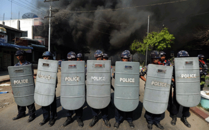 FILE: Policemen in riot-hit Meiktila, central Myanmar. Picture: AFP