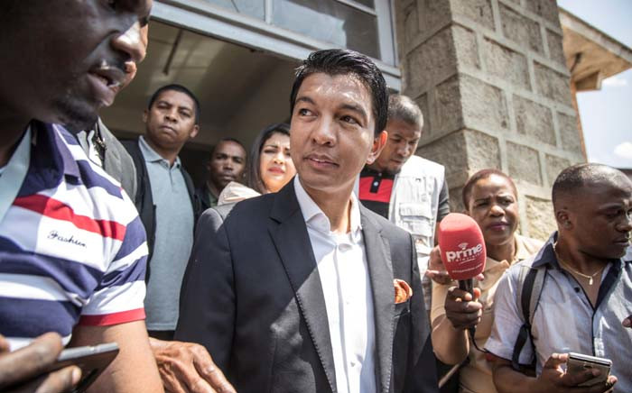 Madagascar presidential candidate Andry Rajoelina talks to media after casting his ballot in Antananarivo on 7 November 2018. Picture: AFP