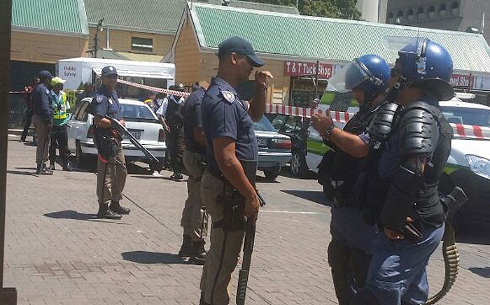 Metro police are pictured at the Grand Parade in Cape Town following unrest. Picture: Adela Gertse/iWitness
