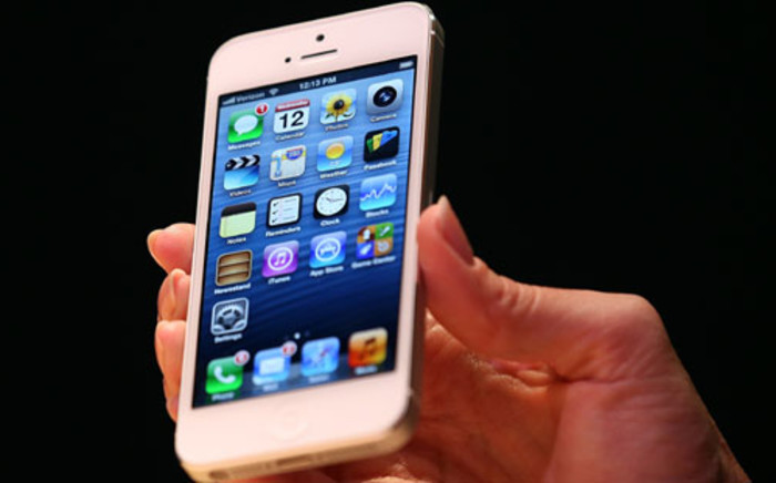 FILE: he new iPhone 5 is displayed during an Apple special event at the Yerba Buena Center for the Arts on September 12, 2012 in San Francisco, California.