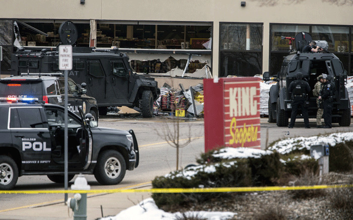 Smashed windows are left at the scene after a gunman opened fire at a King Sooper's grocery store on 22 March 2021 in Boulder, Colorado. Picture: Chet Strange/Getty Images/AFP
