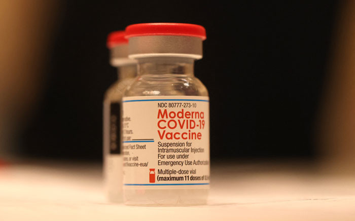 FILE: Vials of Moderna COVID-19 vaccine sit on a table at a COVID-19 vaccination clinic on 6 April 2022 in San Rafael, California. Picture: Justin Sullivan/Getty Images/AFP
