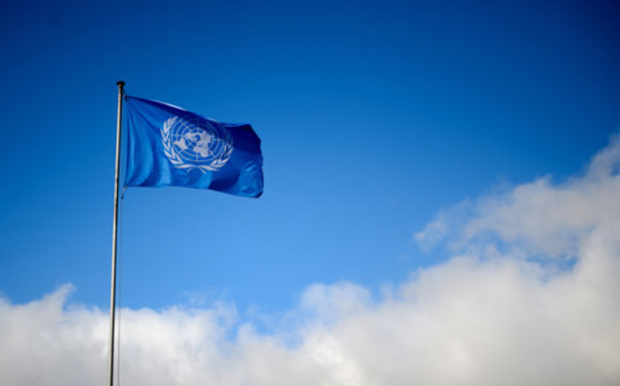 FILE: A flag of the UNited Nations floats at their Geneva’s offices during the third day of face-to-face peace talks in Geneva on 27 January 2014. Picture: AFP.