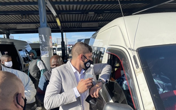 MEC Daylin Mitchell visited the Khayelitsha taxi rank together with Santaco on 7 July 2021 to raise awareness and encouraged minibus taxi users to follow the golden rules of hygiene for keeping safe and complying with Alert level 4 regulations. Picture: Daylin Mitchell/Twitter