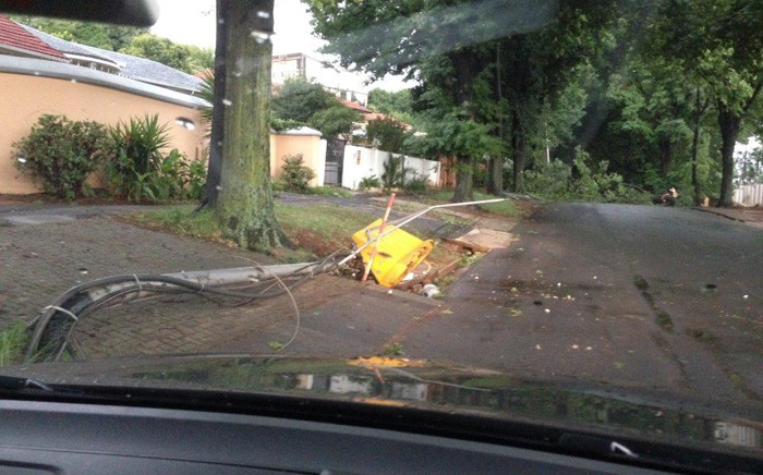 FILE: A tree fall across the street and taken down four street poles with all the electric cables during a storm in Gauteng. Picture: EWN.