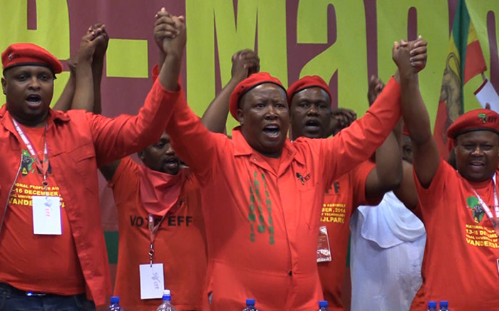 EFF leader Julius Malema is joined in song by his party's leadership during the EFF's Assembly at the Free State University in Bloemfontein, Sunday 14 December 2014. Picture: Vumani Mkhize/EWN.