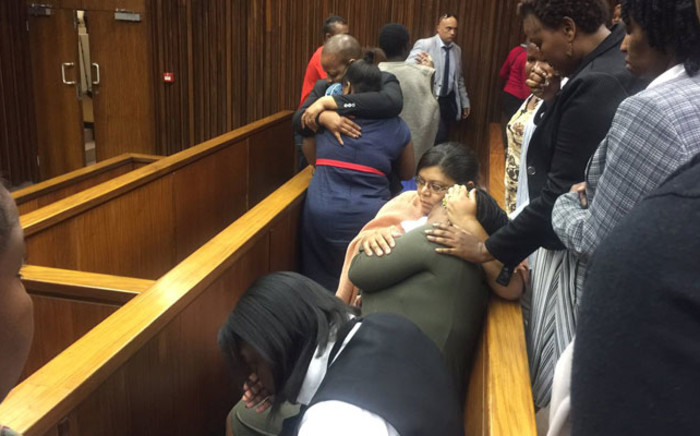 The two women who were raped and widowed broke down in court as Judge Masopa handed down his judgment, they were comforted by friends and relatives. Picture: Thando Kubheka/EWN.