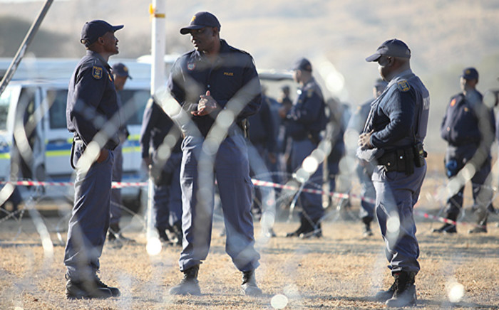 FILE: Police closely monitor protests in Marikana in the North West on 14 August 2012. Picture:EWN.