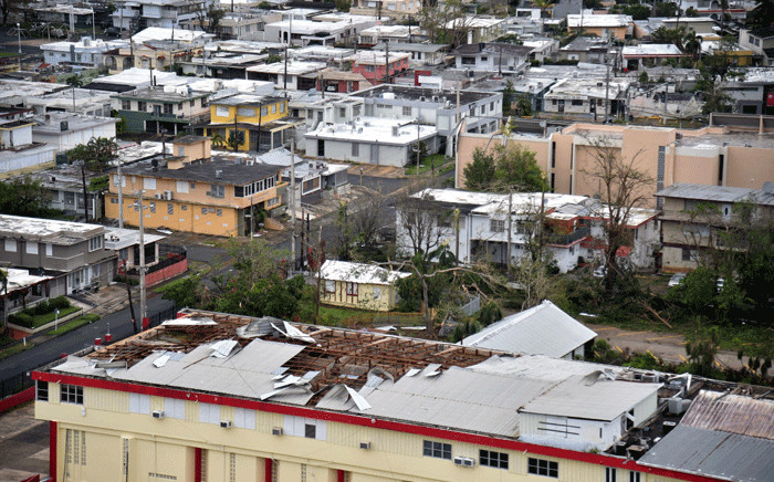 A view of a destroyed roof of a school in the Rio Piedras area, in San Juan, Puerto Rico, on 21 September 2017 after the area was pummelled by Hurricane Maria which devastated the island and knocked out the entire electricity grid. Picture: AFP.