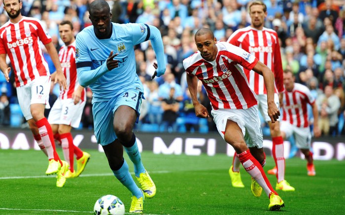 "Manchester City's Yaya Toure (L) vies for the ball with Steven N'Zonzi of Stoke City during the English Premier League match between Manchester City and Stoke at the Etihad stadium in Manchester, Britain, 30 August 2014. Picture: EPA.