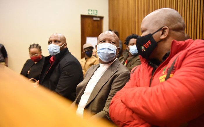 Economic Freedom Fighters (EFF) leader Julius Malema (wearing brown jacket) appears in the Randburg Magistrates Court on 13 October 2020. Picture: @EFFSouthAfrica/Twitter
