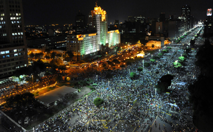 People march in downtown Rio de Janeiro on 20 June 2013 during a protest called the 'Tropical Spring' against corruption and price hikes. Picture: AFP.