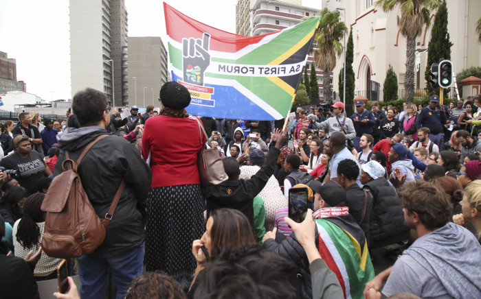 Protesters closed the roads in front of Parliament following the cabinet reshuffle. Picture: Cindy Archillies/EWN.