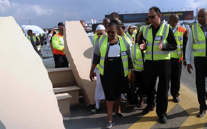 Transport Minister Dipuo Peters walks with Lead SA representative Yusuf Abramjee during a road safety intervention on the N14 on 19 March 2015. Picture: Lead SA via Twitter.