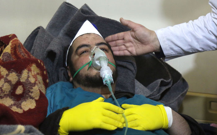 FILE: A Syrian man receives treatment at a small hospital in the town of Maaret al-Noman following a suspected toxic gas attack in Khan Sheikhun, a nearby rebel-held town in Syria’s northwestern Idlib province, on 4 April 2017. Picture: AFP