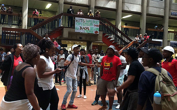 Wits Fees Must Fall members protested on 11 January 2016 as first years queued around them for registration. Picture: EWN/Govan Whittles.