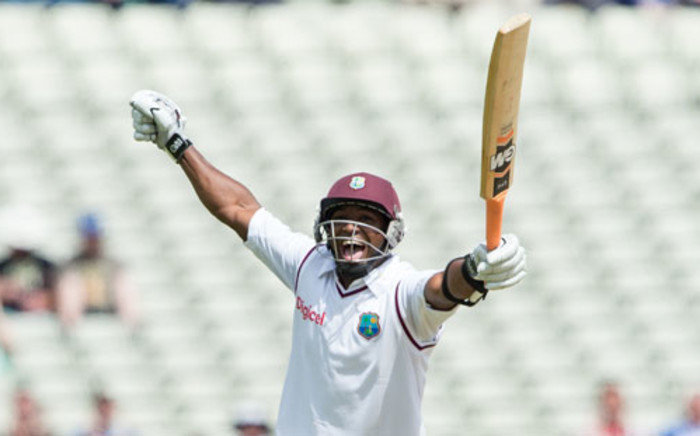 West Indies Tino Best celebrates after reaching 50 runs during the fourth day of the third Test match between England and West Indies at Edgbaston in Birmingham, central England, on June 10, 2012. Picture: AFP