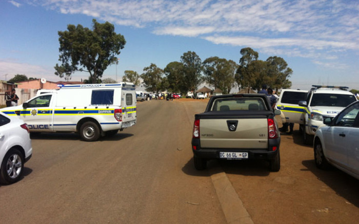 FILE: Police at the scene where three people have been gunned down in Boksburg on the East Rand in what appears to be a fresh wave of taxi violence on 20 November 2014. Picture: Christa Eybers/EWN.