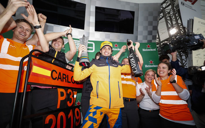 McLaren's Carlos Sainz celebrates his third-place finish at the Brazilian Grand Prix on 17 November 2019. Picture: @McLarenF1/Twitter