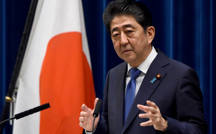 FILE: Japan's Prime Minister Shinzo Abe gestures as he answers questions during a press conference at his official residence in Tokyo on 25 September 2017. Picture: AFP.