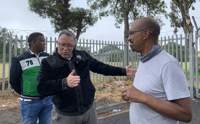 The Western Cape ANC's Cameron Dugmore (centre), along with other party members, on 2 February 2022 visited a site in Claremont set to be auctioned off by the City of Cape Town. Picture: Kaylynn Palm/Eyewitness News