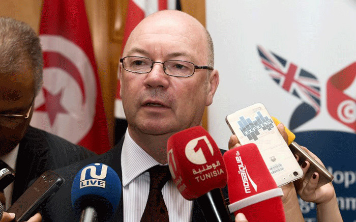 FILE: British minister of state for the Middle East and North Africa, Alistair Burt (L). Picture: AFP.