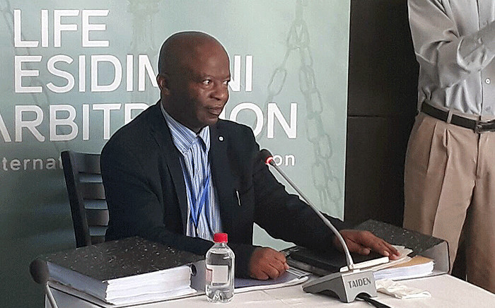 State witness Levy Mosenogi, the Gauteng Health Department Chief Director of planning, policy and research, testifies during the Life Esidimeni arbitration process. Picture: Masego Rahlaga/EWN.