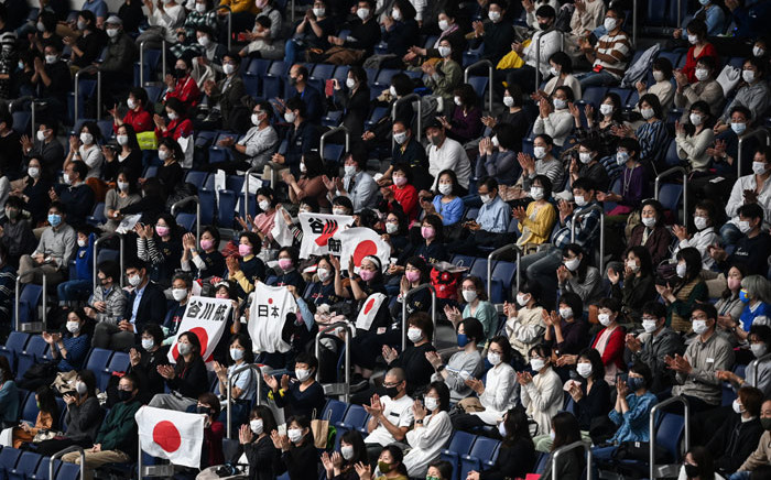 People attend the Friendship and Solidarity Competition gymnastics event in Tokyo on 8 November 2020, the first major international sporting event in the Japanese capital since the Tokyo 2020 Olympic Games was postponed due to the coronavirus pandemic. Picture: AFP