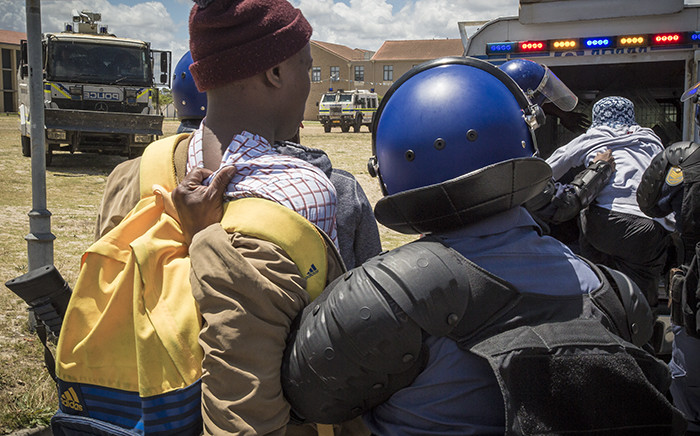 Police arrest protesting students at the Cape Peninsula University of Technology Bellville Campus. Picture: Thomas Holder/EWN